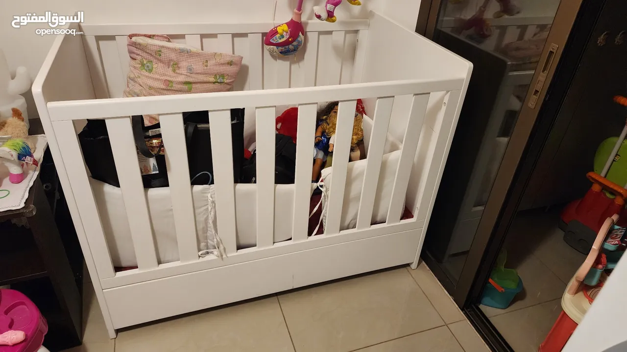 like new baby bed with mattress included