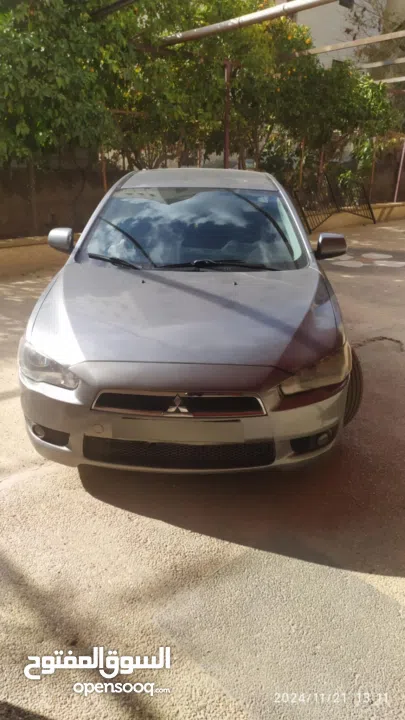 سيارة ممتازة جدا لانسر 2012 عداد 126 الف اصل برايفت ماتور 1600