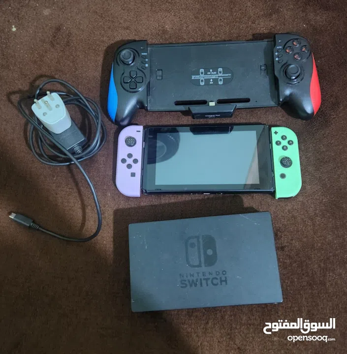 نينتندو سويتش مع كينترولارنينتندو سويتش مع كينترولارنينتندو سويتش مع كينترولار