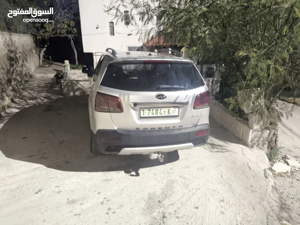 كيا سيرنتو4×4ديزل متور2200 فول اضافات فتحه بانوراما هوك مسجل بترخيص
