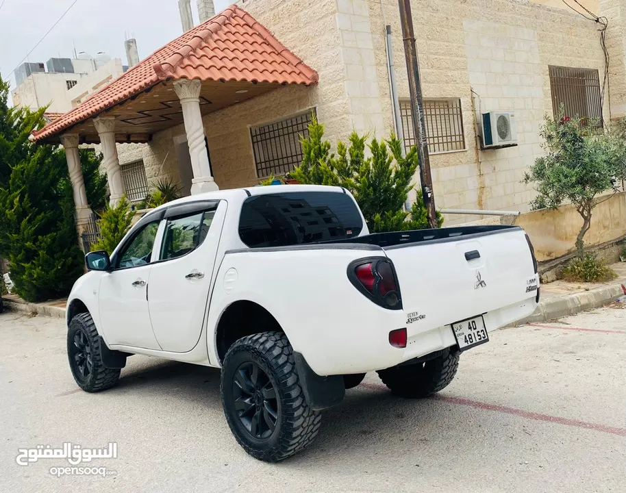 ميتسوبيشي L200 2011 + قطع