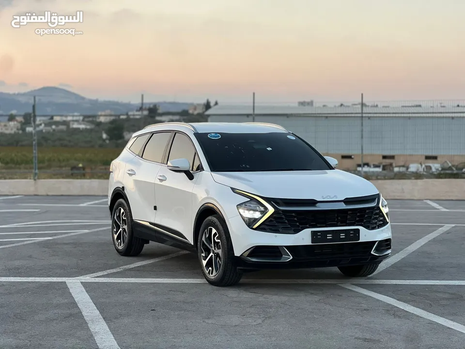 كايا سبورتاج /2022 فل بدون فتحة سقف  2x4 ///240Hp بنزين + كهرباء  ( Haybrid) 1600cc