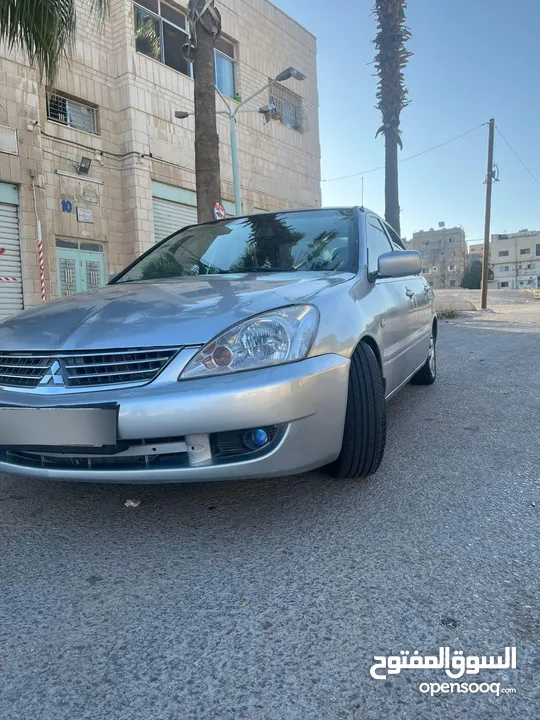 متسوبيشي لانسر 2004محدثه بالكامل 2013