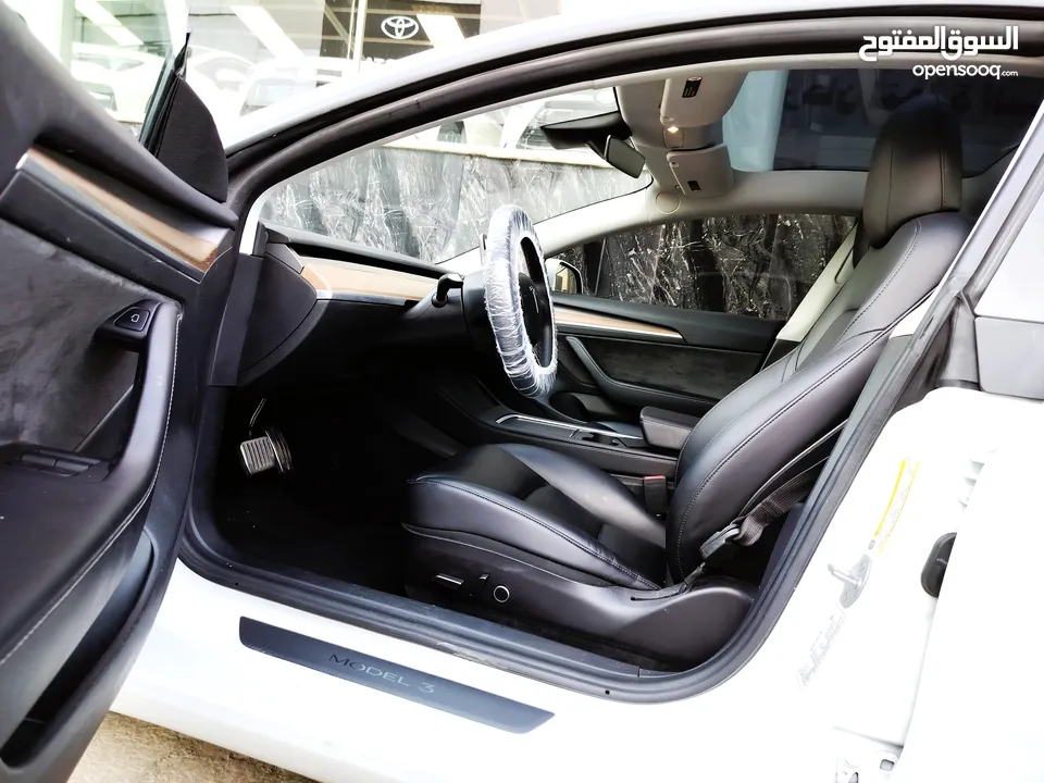 تيسلا 2021 model 3 فحص كامل اوتوسكور +B بحالة الوكالة لون مميز للبيع بسعر لقطة ومحروووق