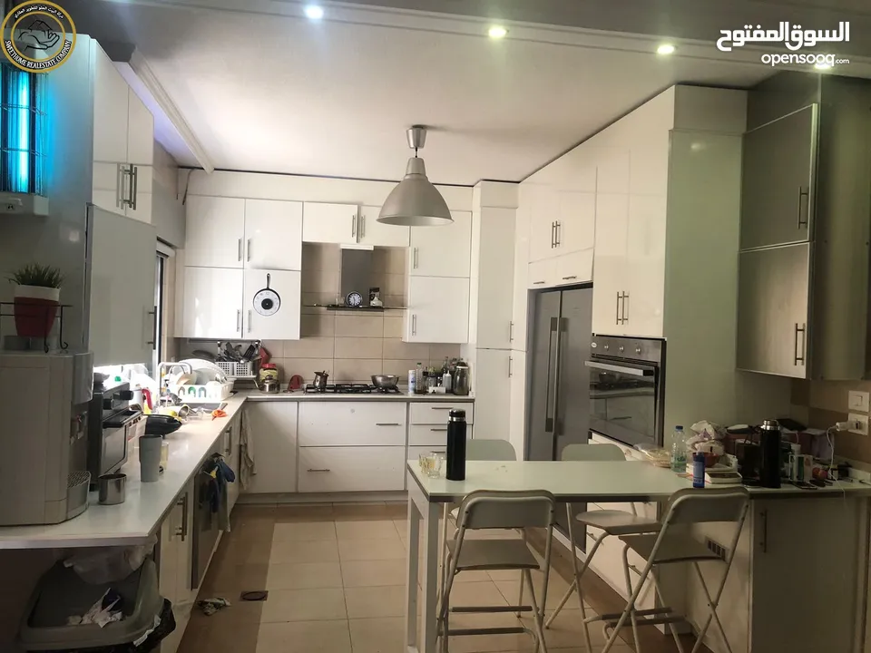 شقة أرضية مفروشة فاخرة للبيع في خلدا 200م مع حديقة وترسات 200م تشطيب سوبر ديلوكس