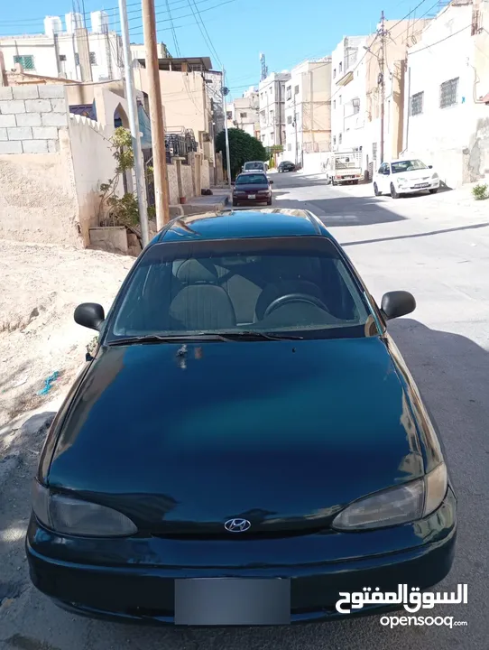 هونداي اكسنت توماتيك اصلي موديل 95 مكيف ثلاجه ترخيص شهر 3/2026 سياره زي ما بالصور واحلى
