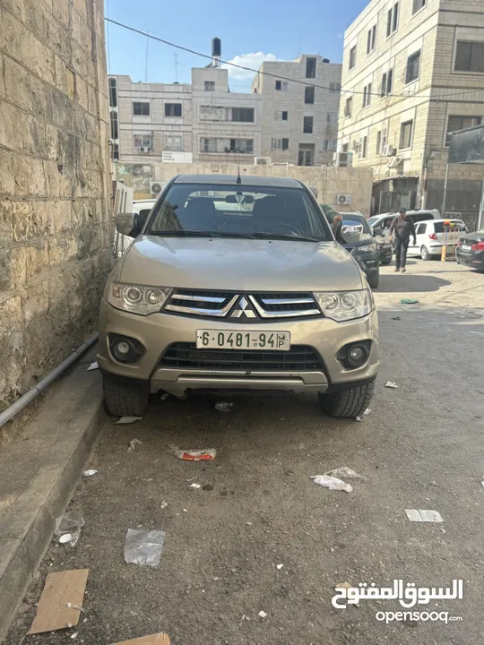 تندر متسبيشي L200 دفع خلفي 4x2 الحالة نظيف و السعر قابل لتفاوض مطور قير نظاف نظاف