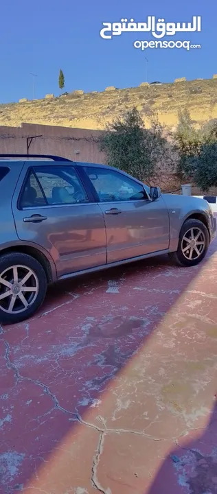 سيارة كاديلاك بحالة ممتازة للبيع بسعر مميز فحص كامل 7 جيد للجادين