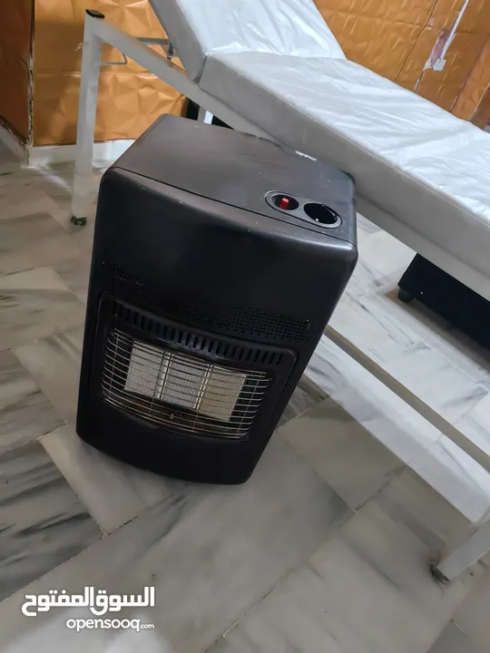 سرير كشف طبي وصوبة غاز مستعملين للبيع