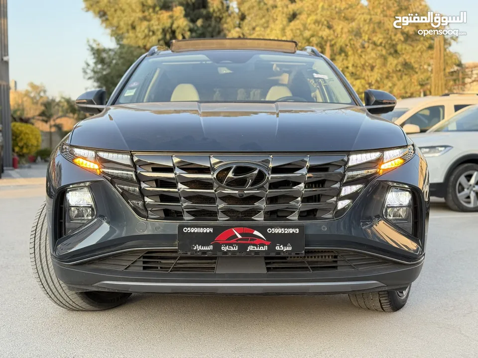هونداي توسان ترخيص 2022 محرك 1600 هايبرد plug in/يقطع على الشحنه 65 كيلو متر  271 حصان