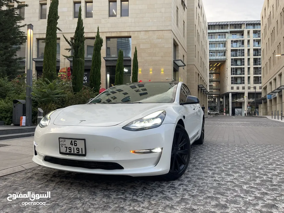 تسلا لون ابيض جمرك اليوم 2023