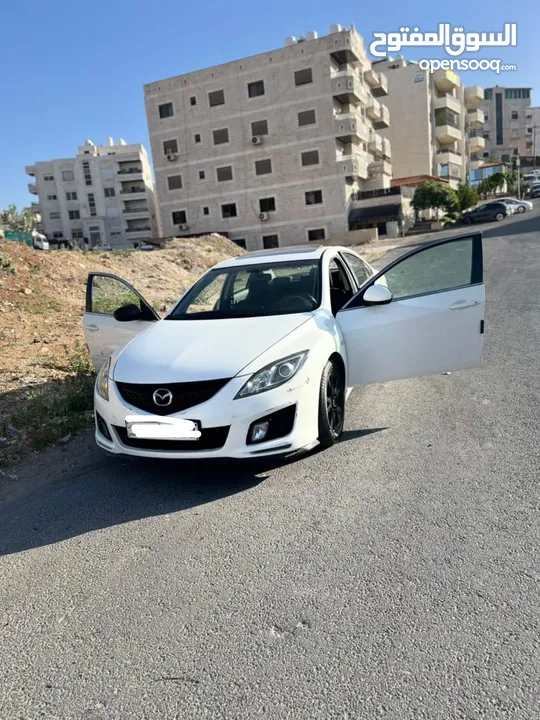 مازدا زووم 6 لون أبيض لؤلؤي للبيع موديل 2009