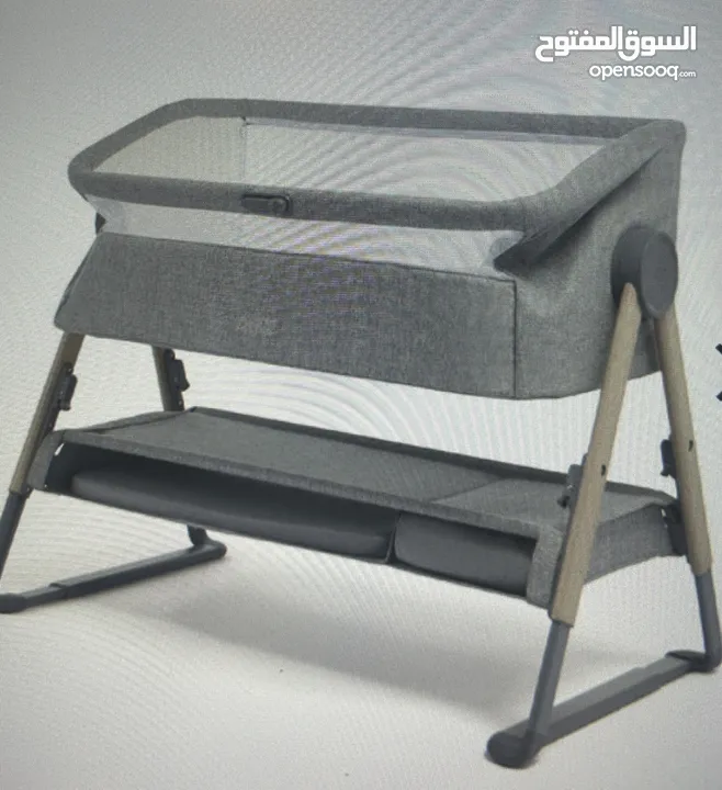 Lua bedside crib from mamas and papas also it comes with Mattress and bed sheet