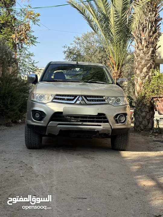 تندر متسبيشي L200 دفع خلفي 4x2 الحالة نظيف و السعر قابل لتفاوض مطور قير نظاف نظاف