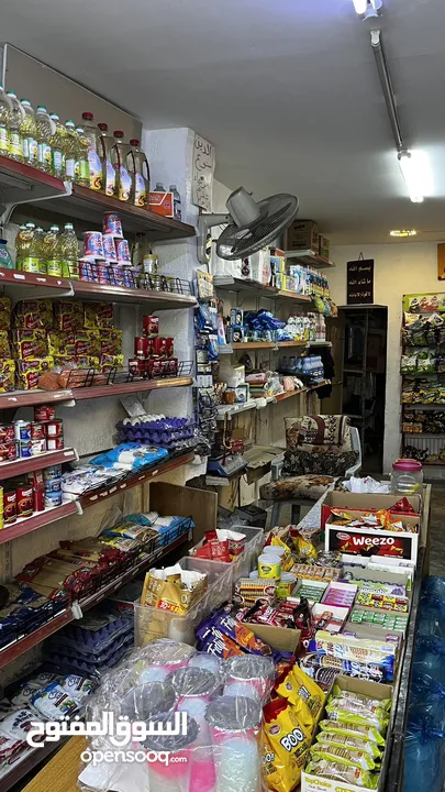 سوبر ماركت على الشارع الرئيسي في جبل الجوفة للبيع خلو