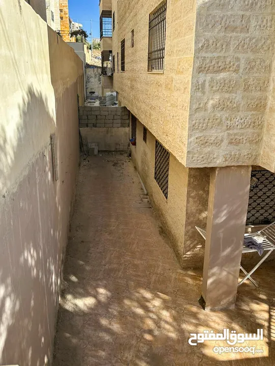 شقة شبه ارضي الحي الجنوبي بالقرب من مستشفى بديعة مساحة 90 متر مربع بسعر مغري