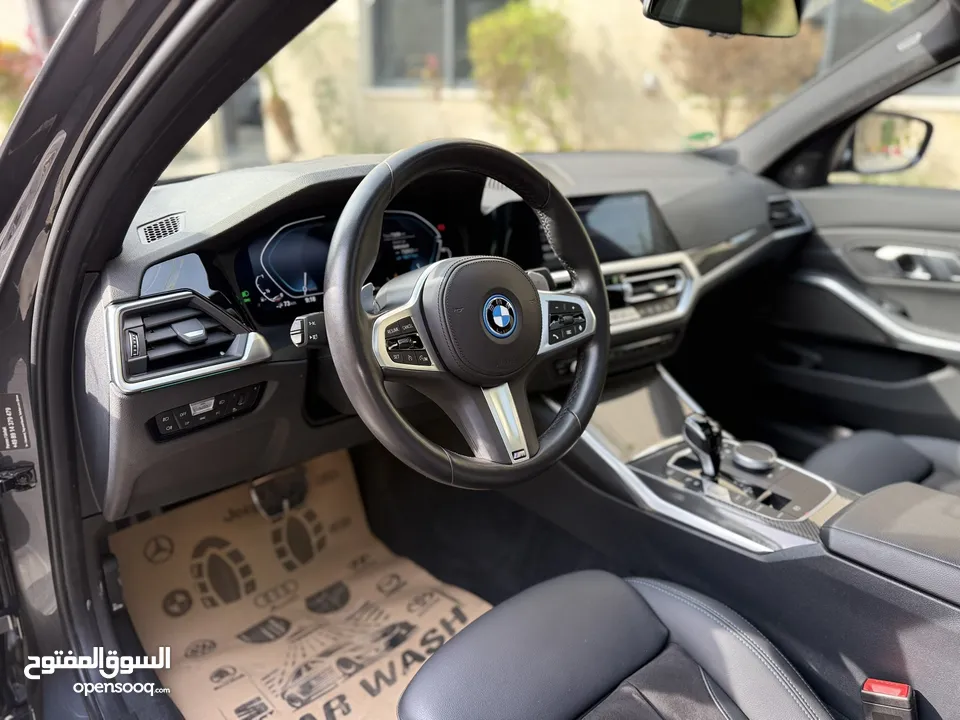 ترخيص 2022 BMW  330e  محرك 2000 هايبرد plug in/يقطع على الشحنه 50 كيلو متر  297 حصان