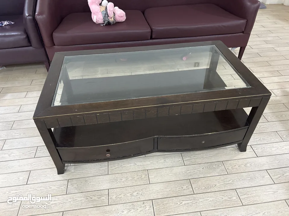 Glass top coffee table wooden