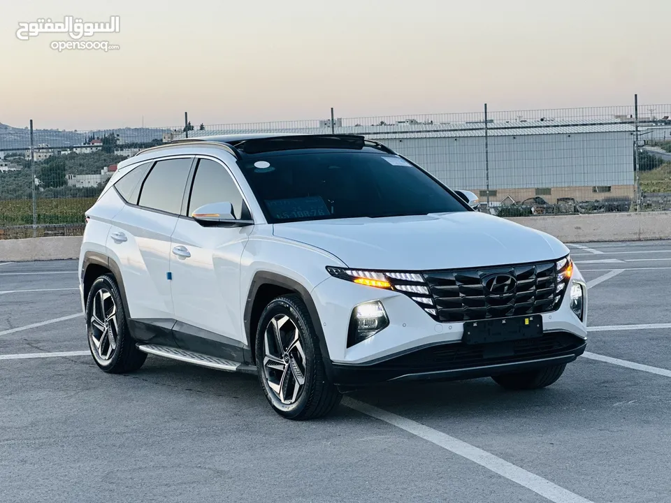 هونداي توسان/2024  فل الفل فتحة سقف بانوراما  2x4 ///240Hp بنزين + كهرباء  ( Haybrid) 1600cc