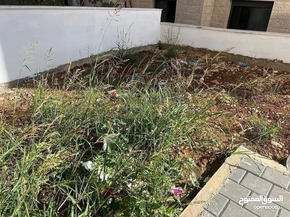 شقه للبيع مع حديقه في عين مصباح قرب مقر الاذاعه والتلفزيون
