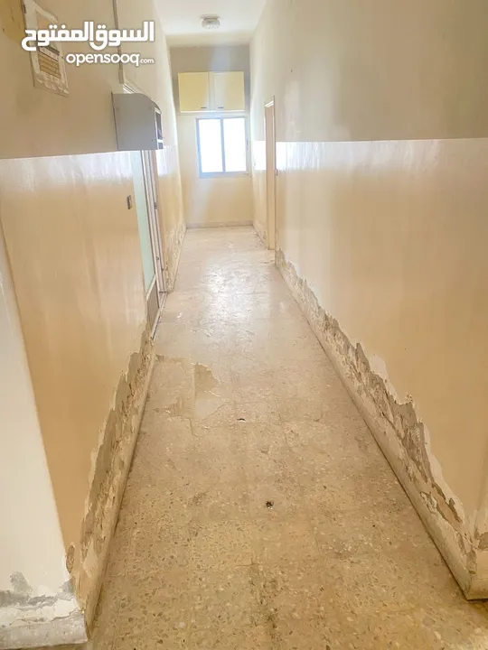 شقتين للبيع (أرضي + تسوية)  الزرقاء حي رمزي في منطقة حيوية جداً