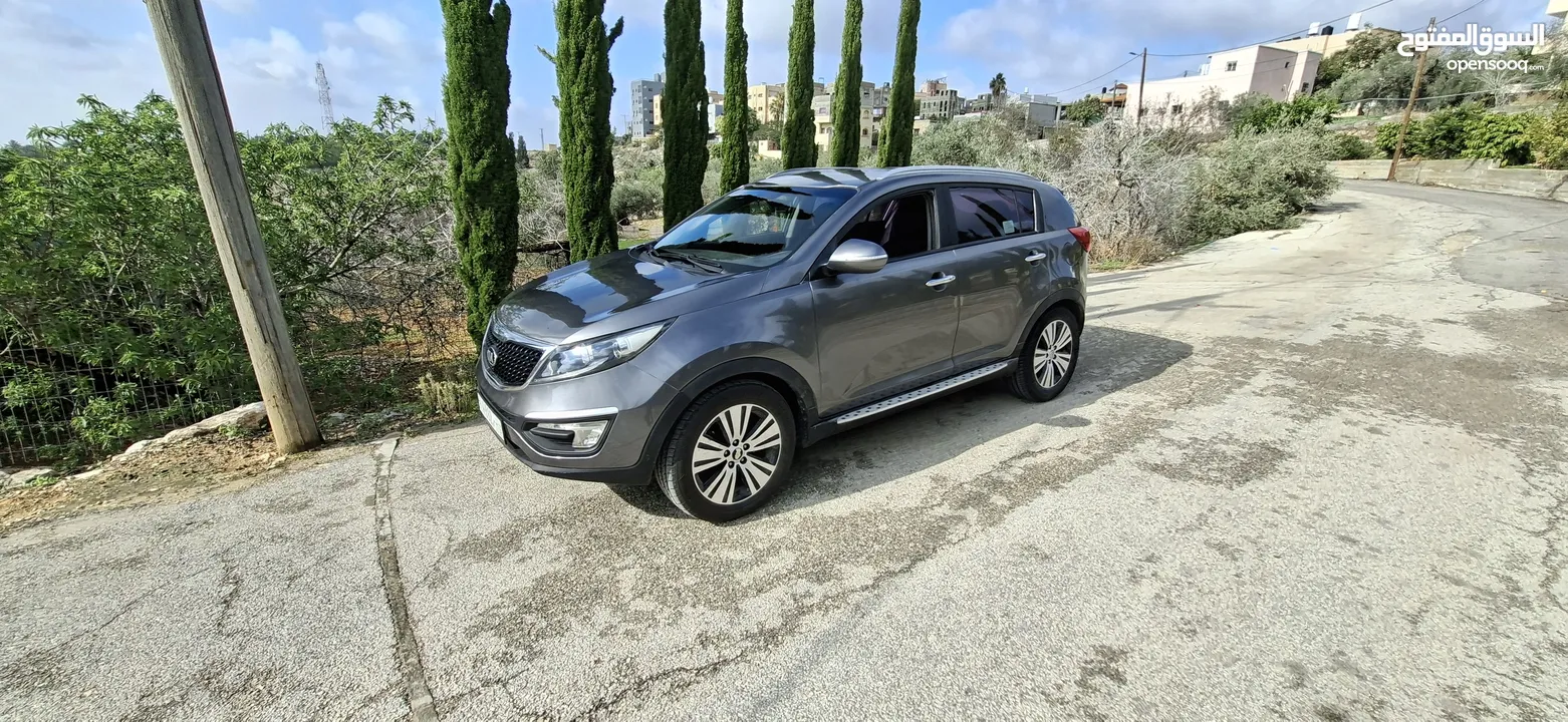 جيب كاياسبورتاج موديل 2014-اتومتيك'دفع 4×4 ماتور 2000ديزل فل فل اضافات ماعد الفتحة - نظيف من الاخر