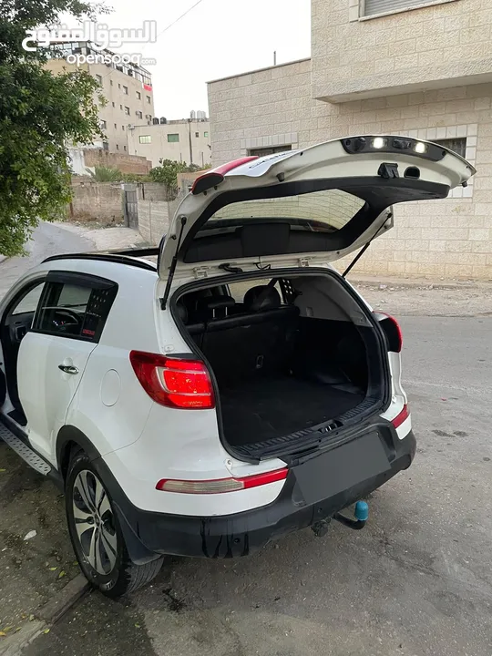 سبورتاج فل الفل فتحه بانورما كل السقف ضواو ليدات قدام ورا  كراسي جلد  صيانه دوريه