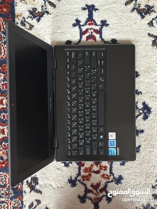 Asus BR1100CKA laptop with charger and bag