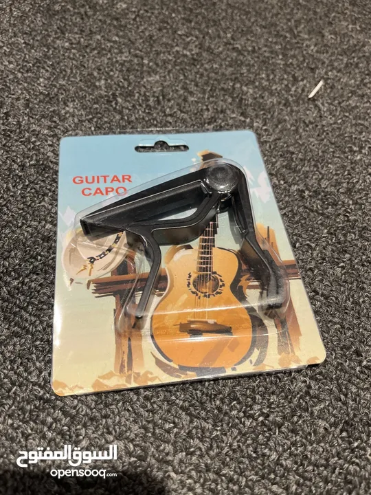 كابو جيتار Guitar Capo فقط 1 دينار