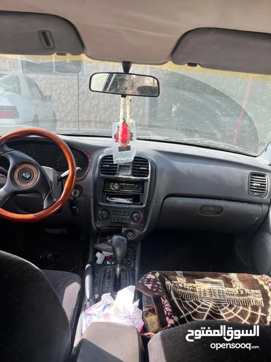 كيا اوبتيما 2002