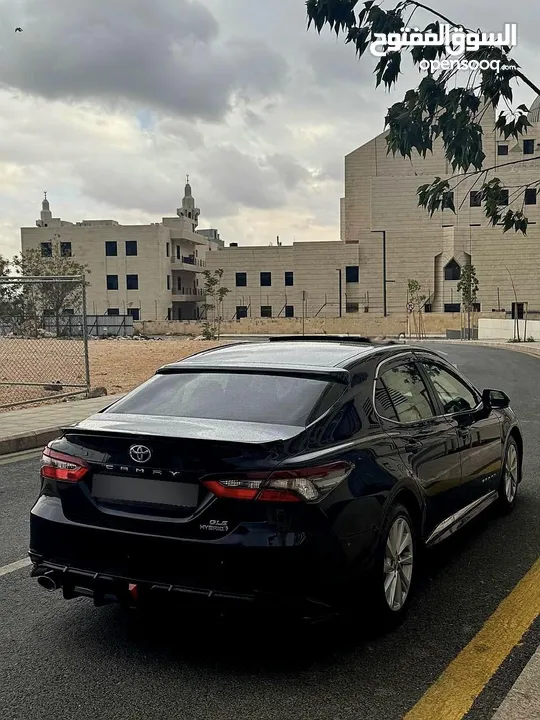 تويوتا كامري 2021 فل كامل مع فتحة فحص كامل 7 جيد كرت ابيض بحالة الشركة