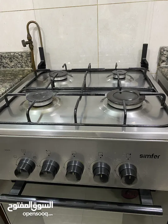 Cooking range 4 burners available after 4 May neat and clean