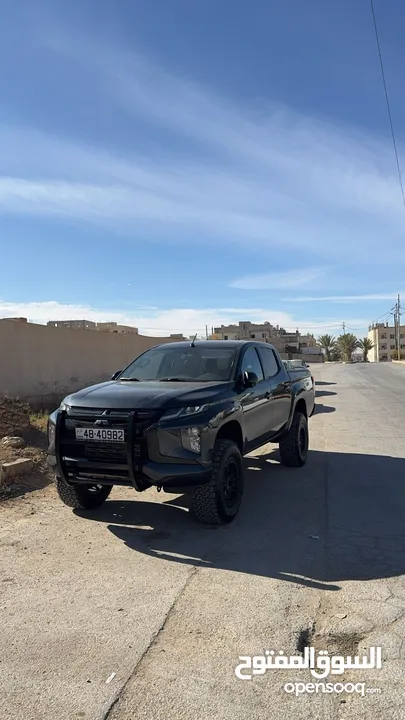 معدل Mitsubishi L200 sportero 2023 وارد و كفالة الوكالة اعلى صنف