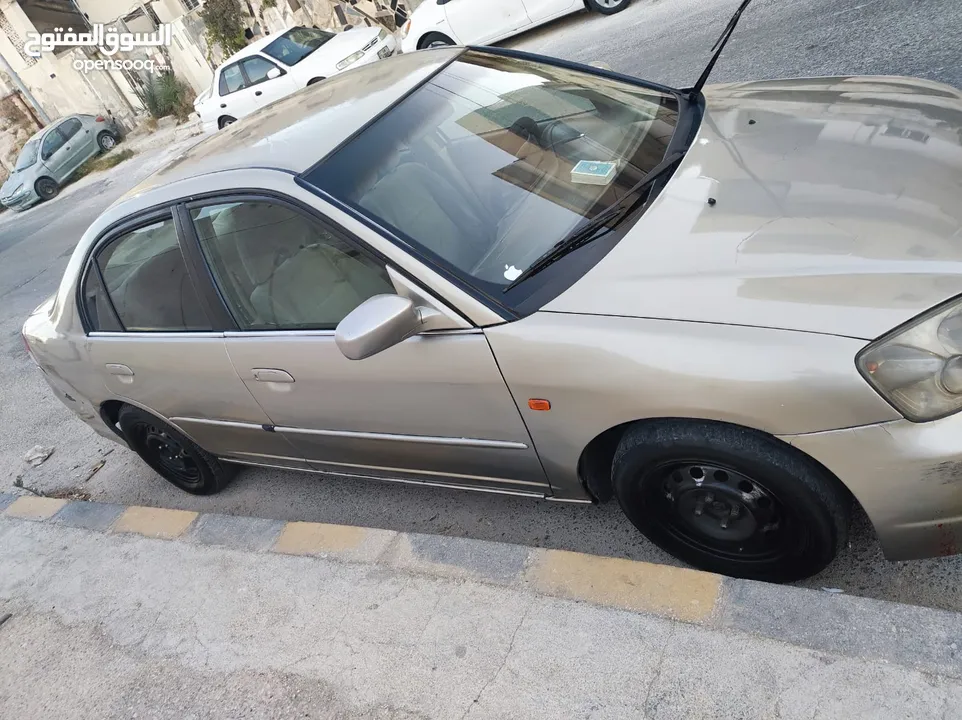 هوندا سيفيك لون ذهبي موديل 2003 جير عادي  إقتصادية جدا تقطع بالتنكة 280 كيلو بور ستيرنح سنتر لوك