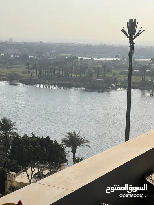 شقه فندقية للايجار اليومي كورنيش النيل موقع متميز فيو النيل و الاهرامات