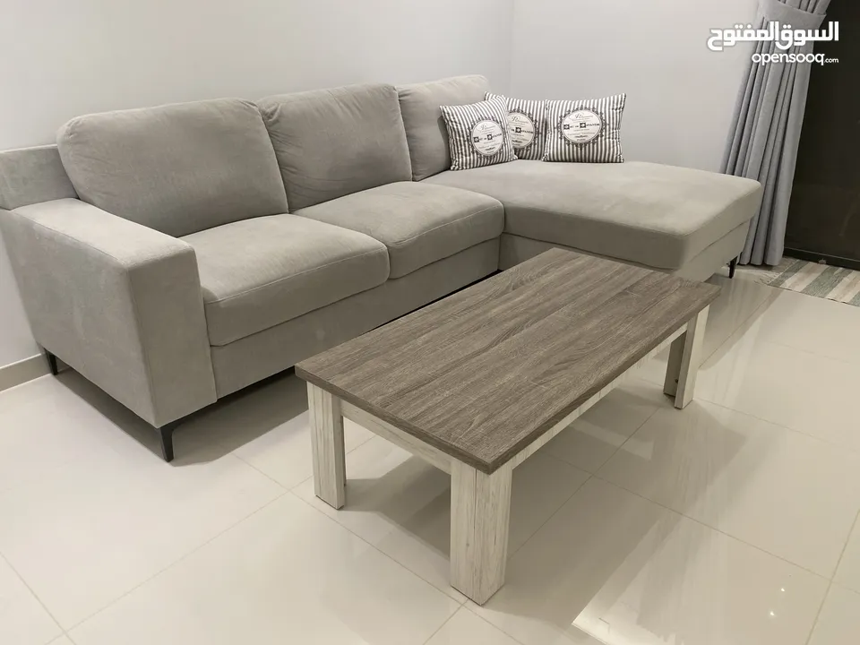 Sofa 4 seats with coffee table and pillows