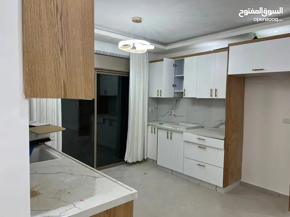 شقه مفروشه جديد للايجار قرب الكليه الاهليه وبنك فلسطين