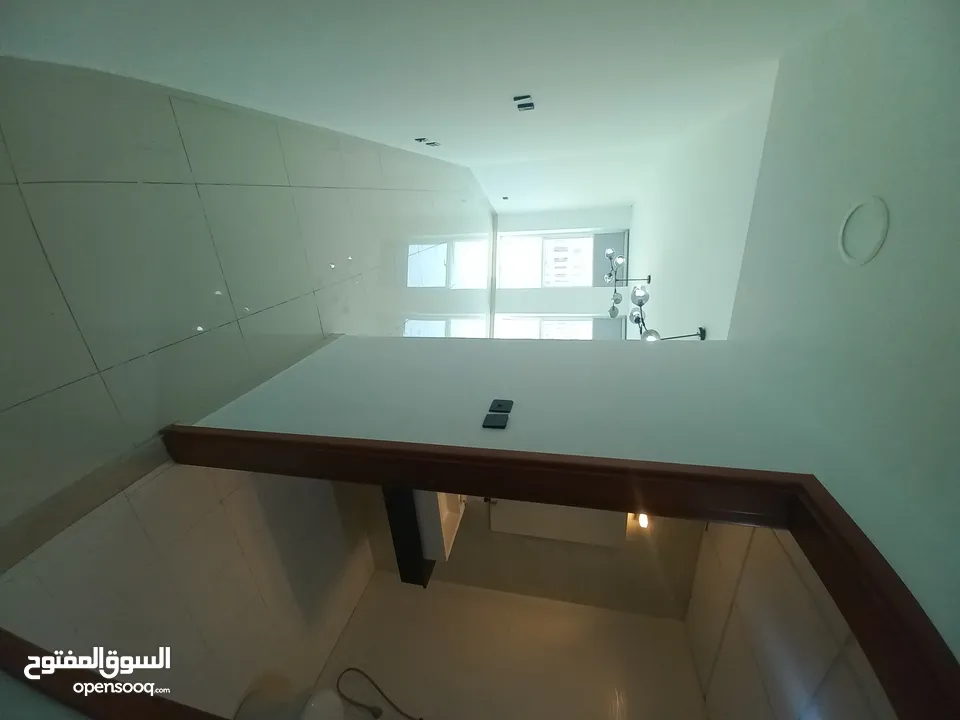 spacious flat 1 bkh in grand mall ,Al khwair