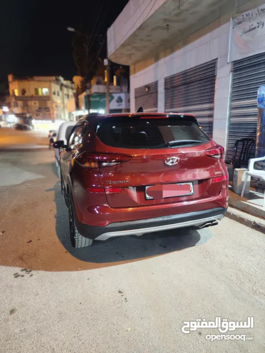 هونداي توسان 2019 فل إضافات جنط مغنيسيوم كراسي جلد لون خمري كهرباء فتحة سقف بانوراما تدفئة وتبريد