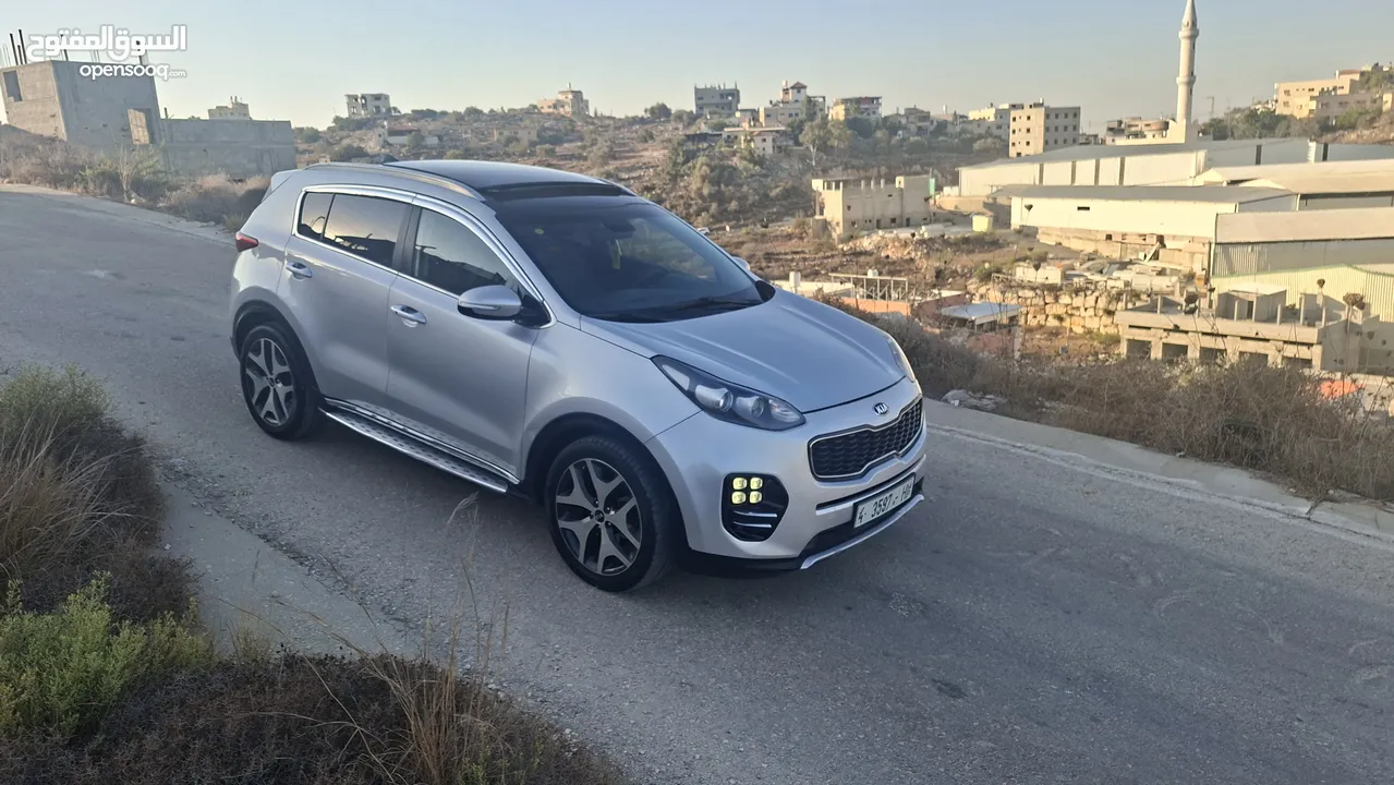 كيا سبورتج جتي لاين 2016ماتور2000ديزل فلل اضافات مع فتحة سقف بنوراما  بسعر حررررق كاش دهان شركة