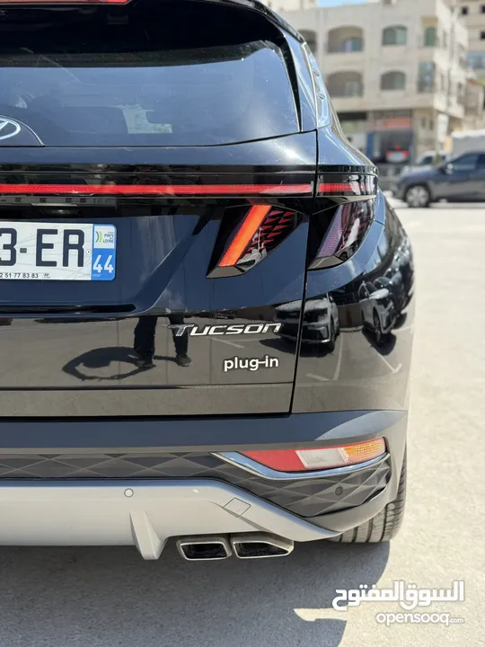 هونداي توسان ترخيص 2022 محرك 1600 هايبرد plug in/يقطع على الشحنه 52 كيلو متر