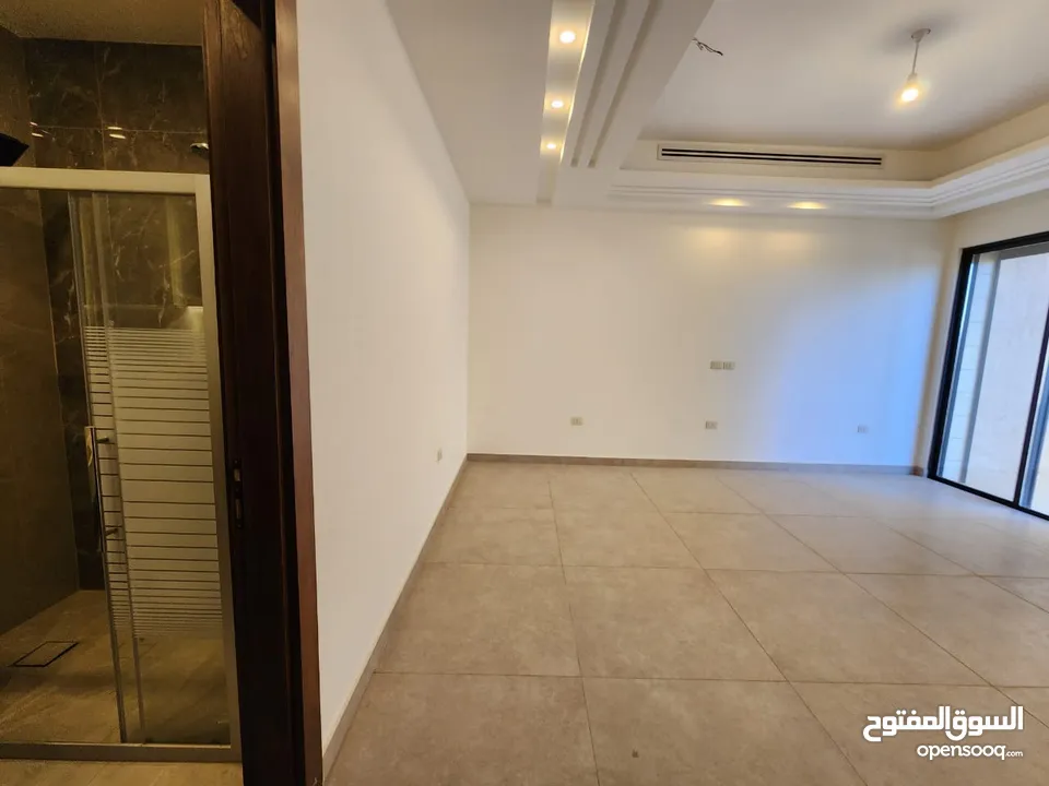 شقة طابقية فاخرة للبيع في عبدون  ref : 14389