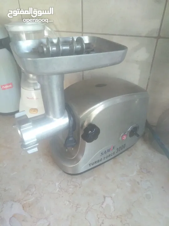 كولر ماء و فرامة لحمة مستعمل وبحالة جديدة
