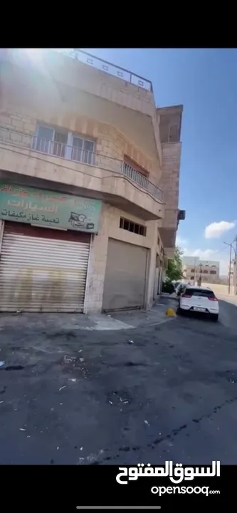 فرصة إستثمارية عمارة تجاري طابقين للبيع - جبل الحسين بالقرب من موقع جبل القلعة الأثري