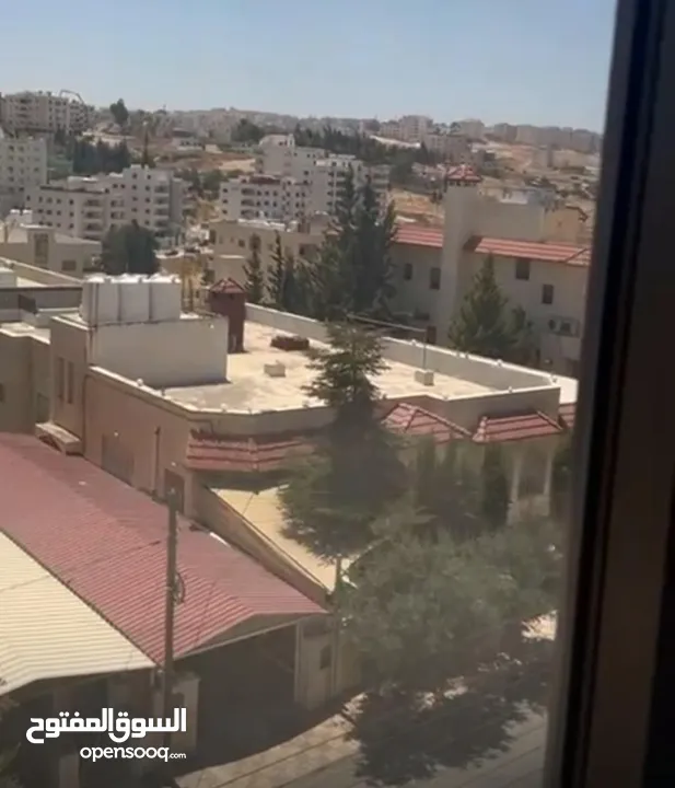Excellent natural light and winds with views of Shafa Badran from the highest level in the building.