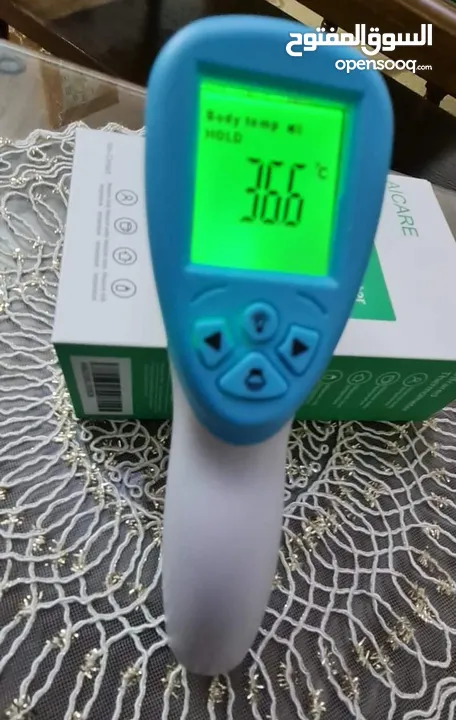 جهاز ميزان حراره دقيق وسريع يقيس درجه الحراره عن بعد في أقل من 3 ثواني عن قرب وبعد يلزم بكل بيت