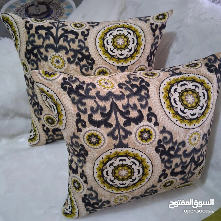 كوشنز كنب ووجه مخدات ومفارش للطاولات