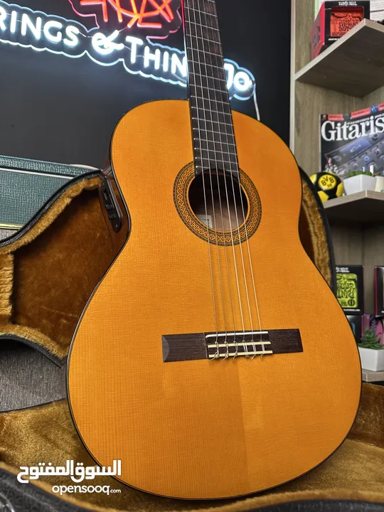 Yamaha CGX102 Plugged Classical Guitar with hardcase – 350 JDs