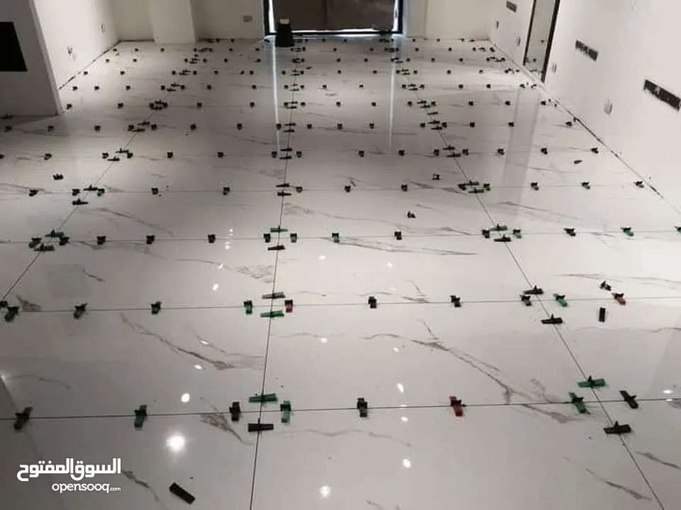 بليط وفني تركيب بديل الرخام وبديل الخشب