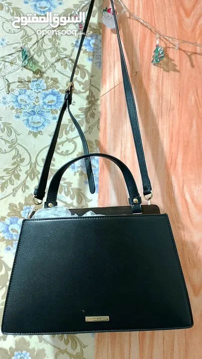 2 bags original preloved no scratch  guess and Charles Keith